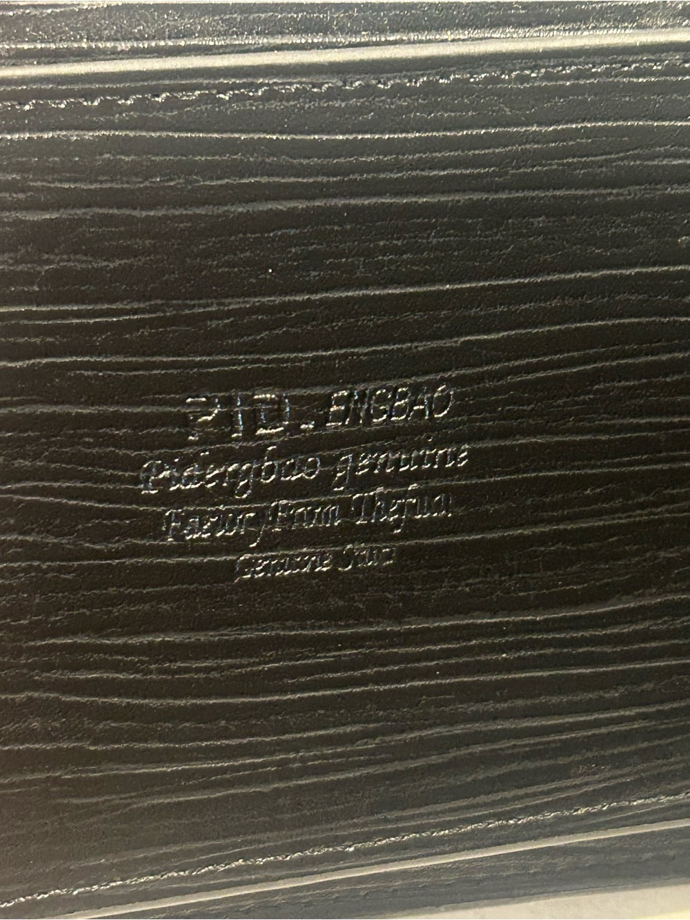 Men's Black Leather Bi-Fold Wallet with Embossed Face and Yellow Eye Accent - Picture 5 of 14